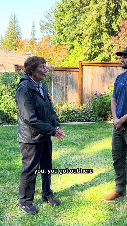 Karen talking with Darcy in her backyard